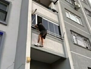 İzmir’de 14 yıl kesinleşmiş hapis cezasıyla aranan uyuşturucu şüphelisi balkonda yakalandı